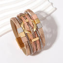 Pulseira Anjo Divino | Couro Multicamadas & Joias Alinhadas