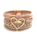 Pulseira Lumina Love | Couro Multicamadas & Coração Dourado